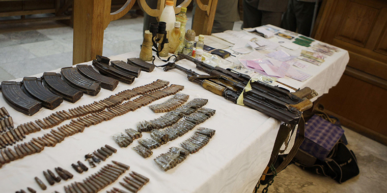 Evidence is displayed during a hearing for suspected members of al-Qaeda in the Islamic Magreb at a military court in Tunis, Tunisia, June 9, 2012.