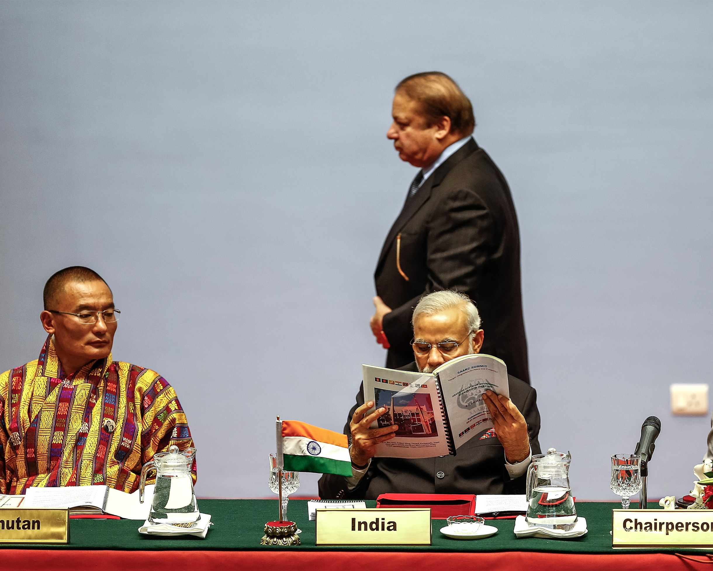 A photo showing Pakistani Prime Minister Nawaz Sharif walking behind Indian Prime Minister Narendra Modi during the 18th SAARC Summit on November 26, 2014 in Kathmandu, Nepal.