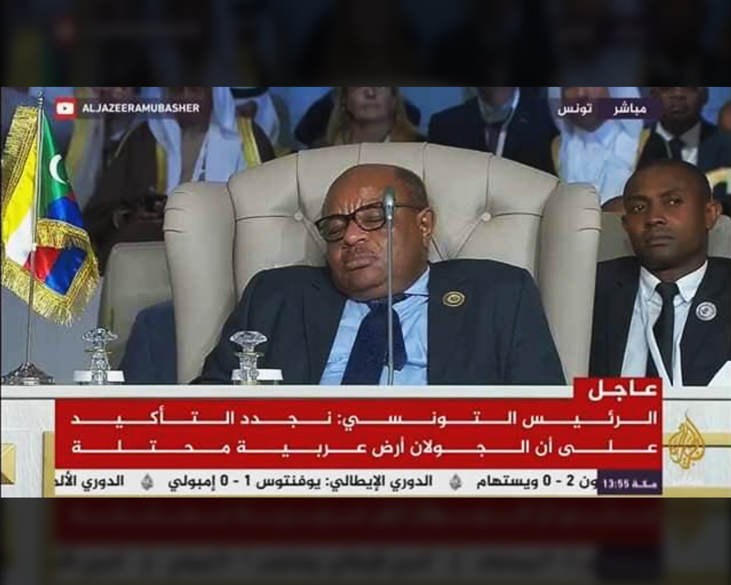 An Al Jazeera news screengrab showing Comoros Foreign Minister Mohamed El Amine apparently sleeping at the Arab League summit in Tunis, Tunisia on March 31, 2019.