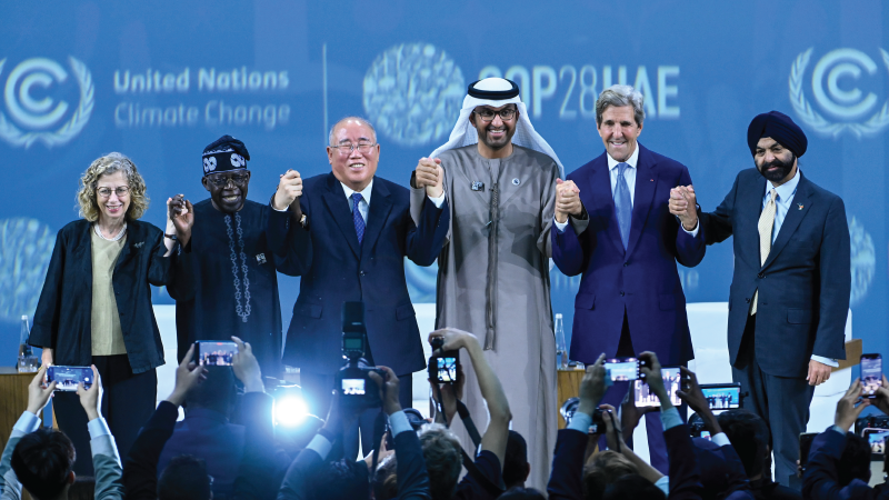 World leaders join hands in a show of unity at the UNFCCC’s 28th Conference of the Parties (COP28) on December 2, 2023, in Dubai, United Arab Emirates. 