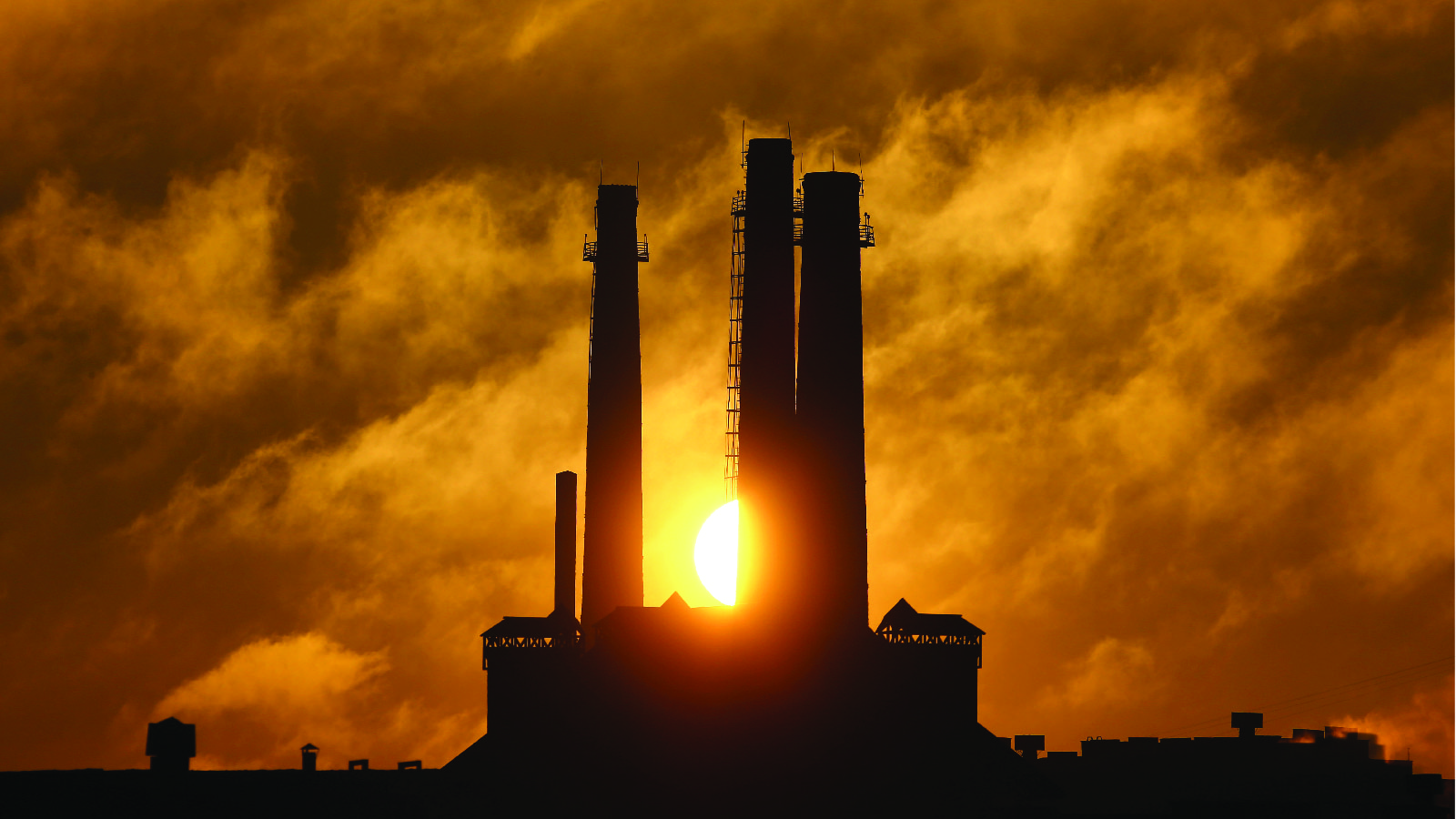 Smokestacks at sunset