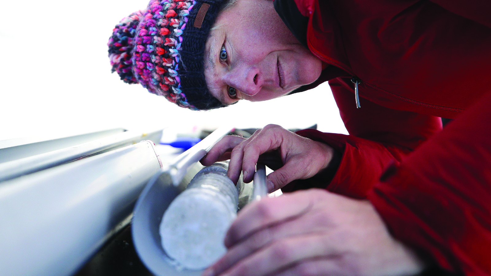 Glaciologist Andrea Fischer examines an ice core from an Austrian glacier 