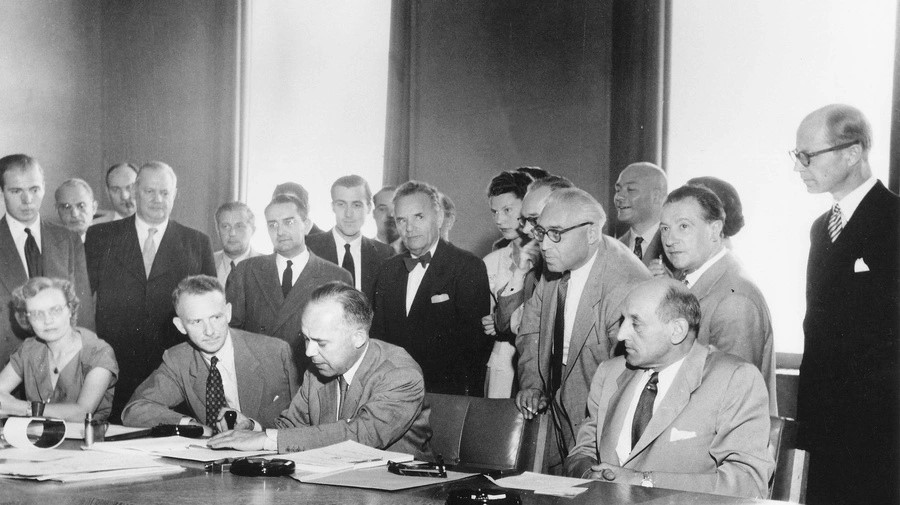 The signing of the 1951 Refugee Convention.