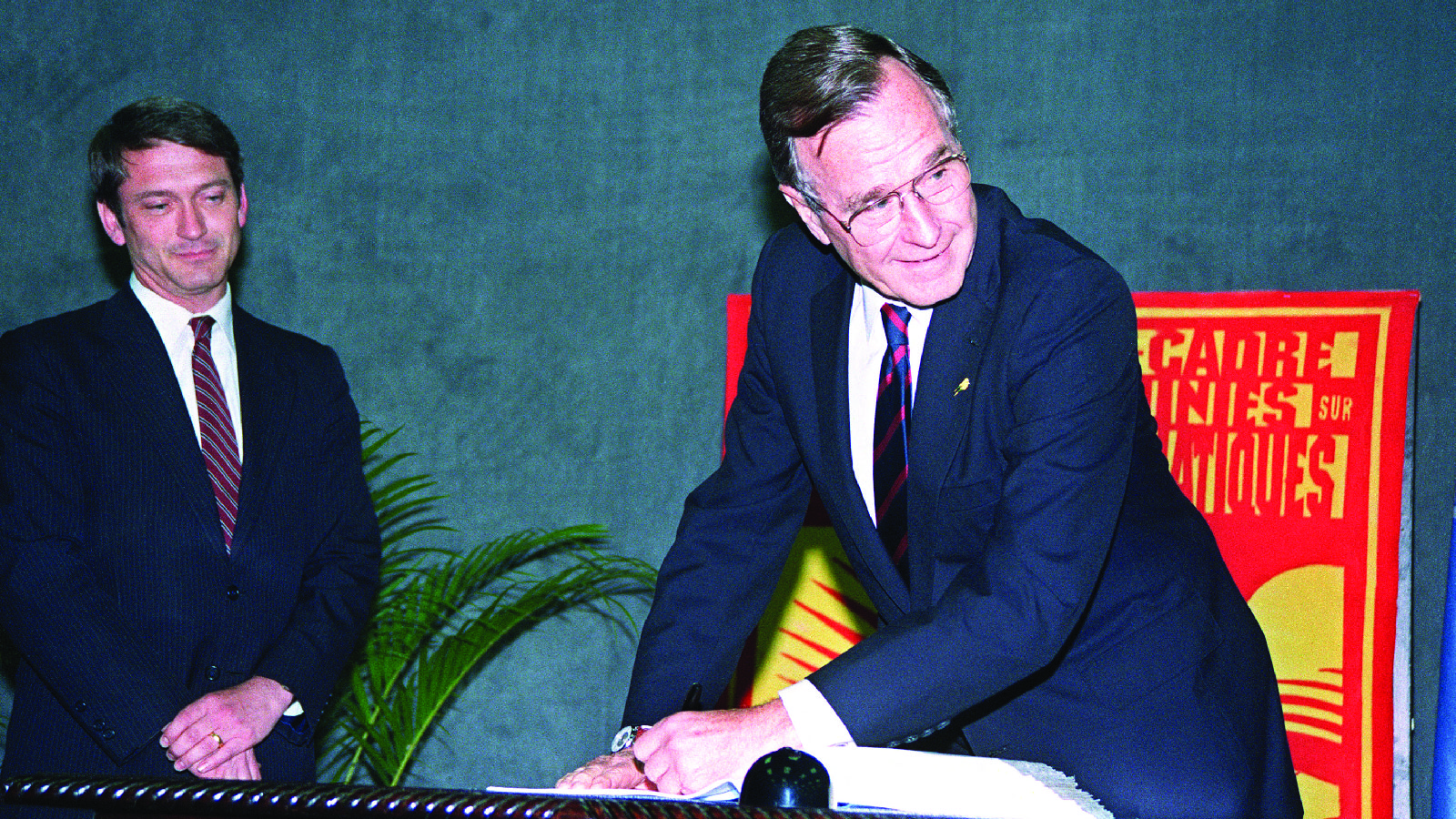 President George H.W. Bush signs the United Nations Climate Change Convention at the UN-sponsored Earth Summit in Rio de Janeiro, Brazil 