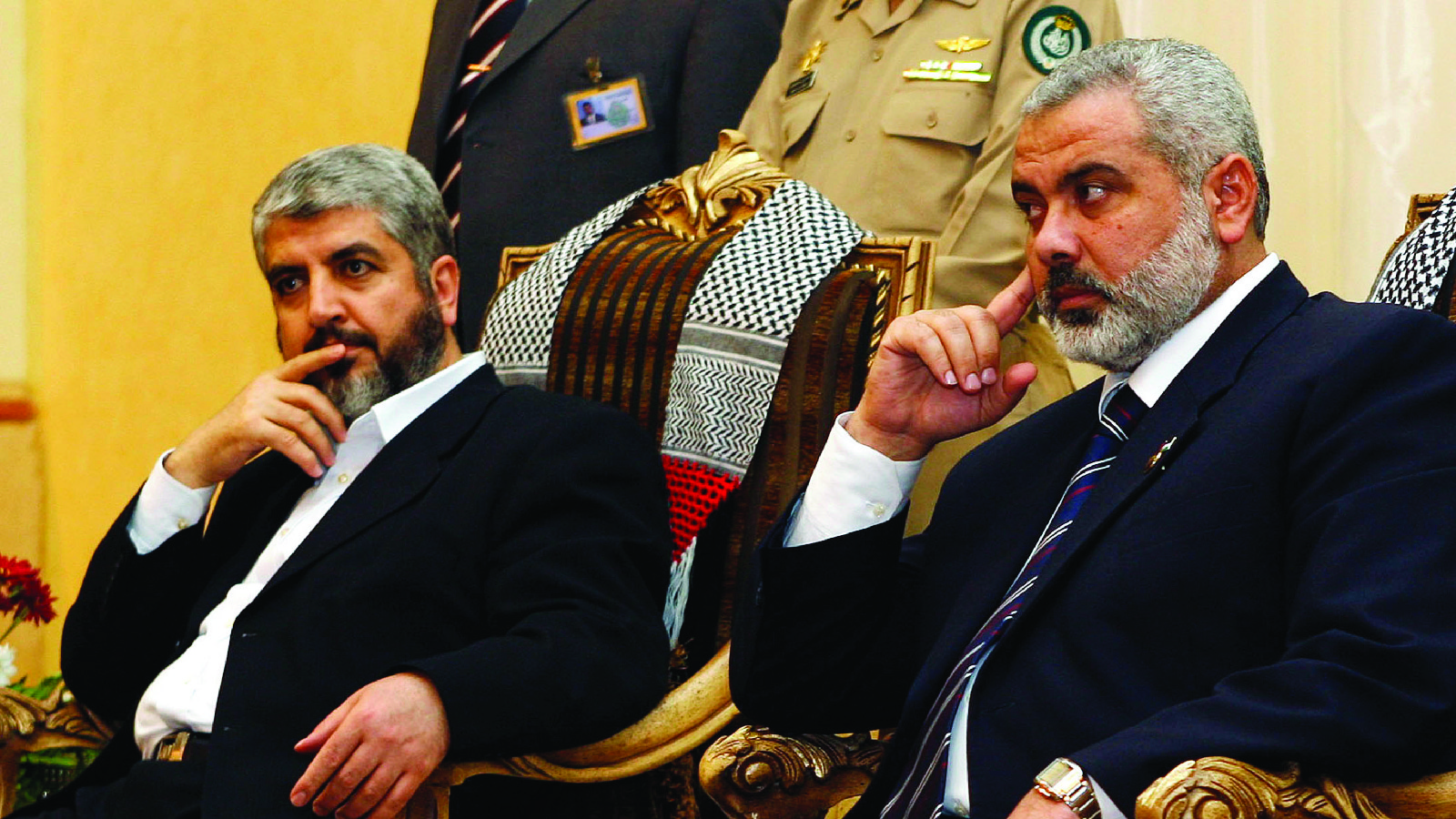 Palestinian Prime Minister Ismail Haniyeh sits to the right of Hamas leader Khaled Meshaal during a meeting in Jeddah, Saudi Arabia on February 10, 2007. 