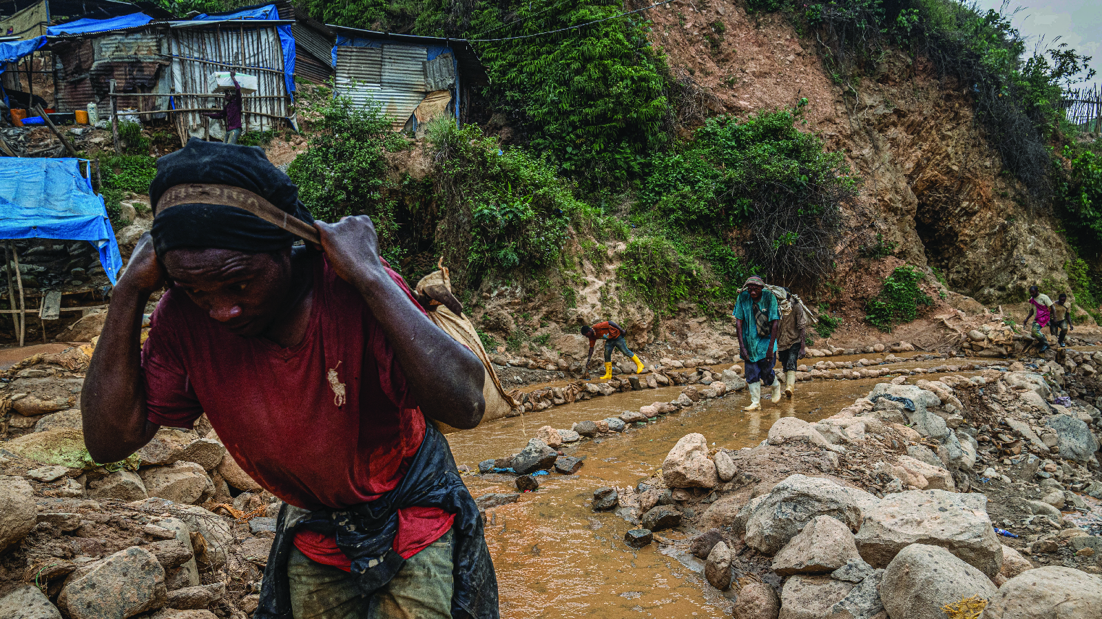 Small-scale artisanal gold miners work without machinery in the South Kivu province, Democratic Republic of Congo, on September 20, 2024.