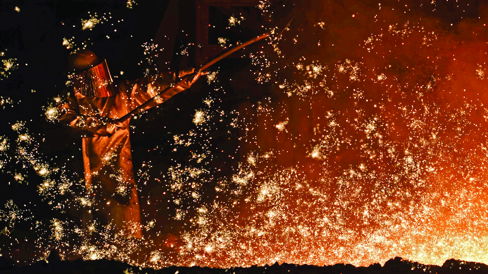  A steelworker at a furnace at a steel company plant in Salzgitter, Germany on March 17, 2015. 