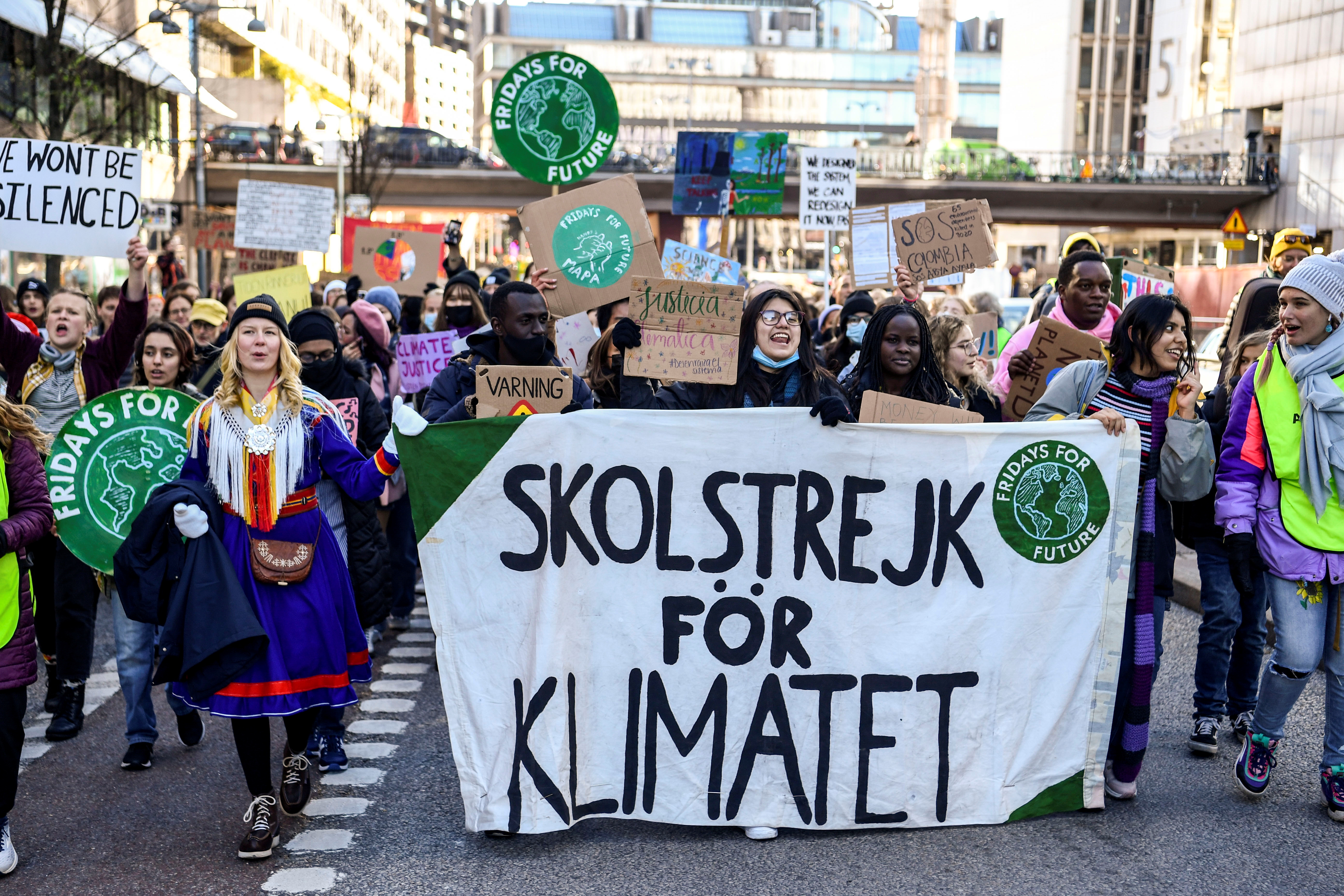 Climate activists take part in the Global Climate Strike arranged by the Fridays For Future movement in Stockholm, Sweden October 22, 2021.