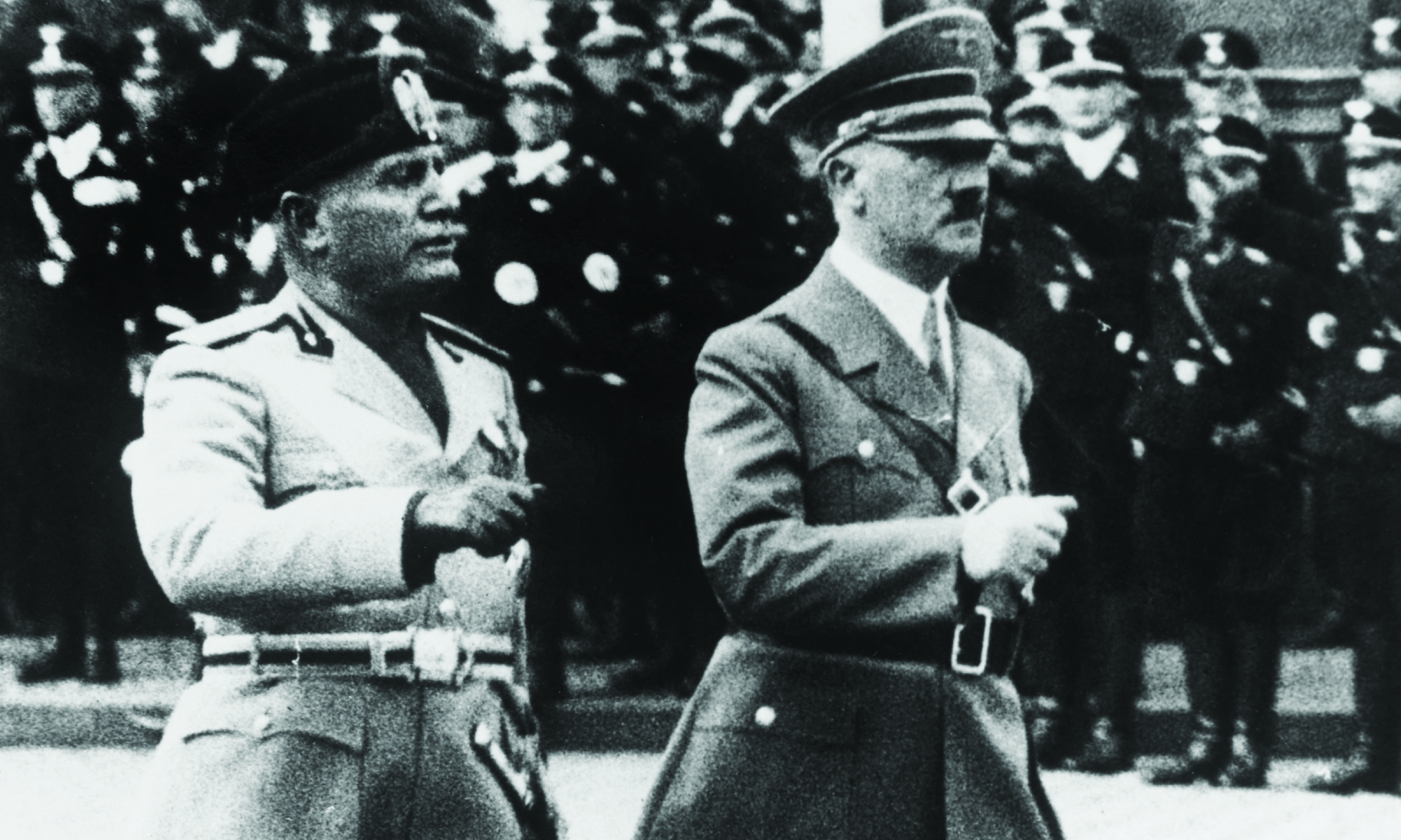 Benito Mussolini (L) and Adolf Hitler (R) at Munich Station in Germany in September 1937.