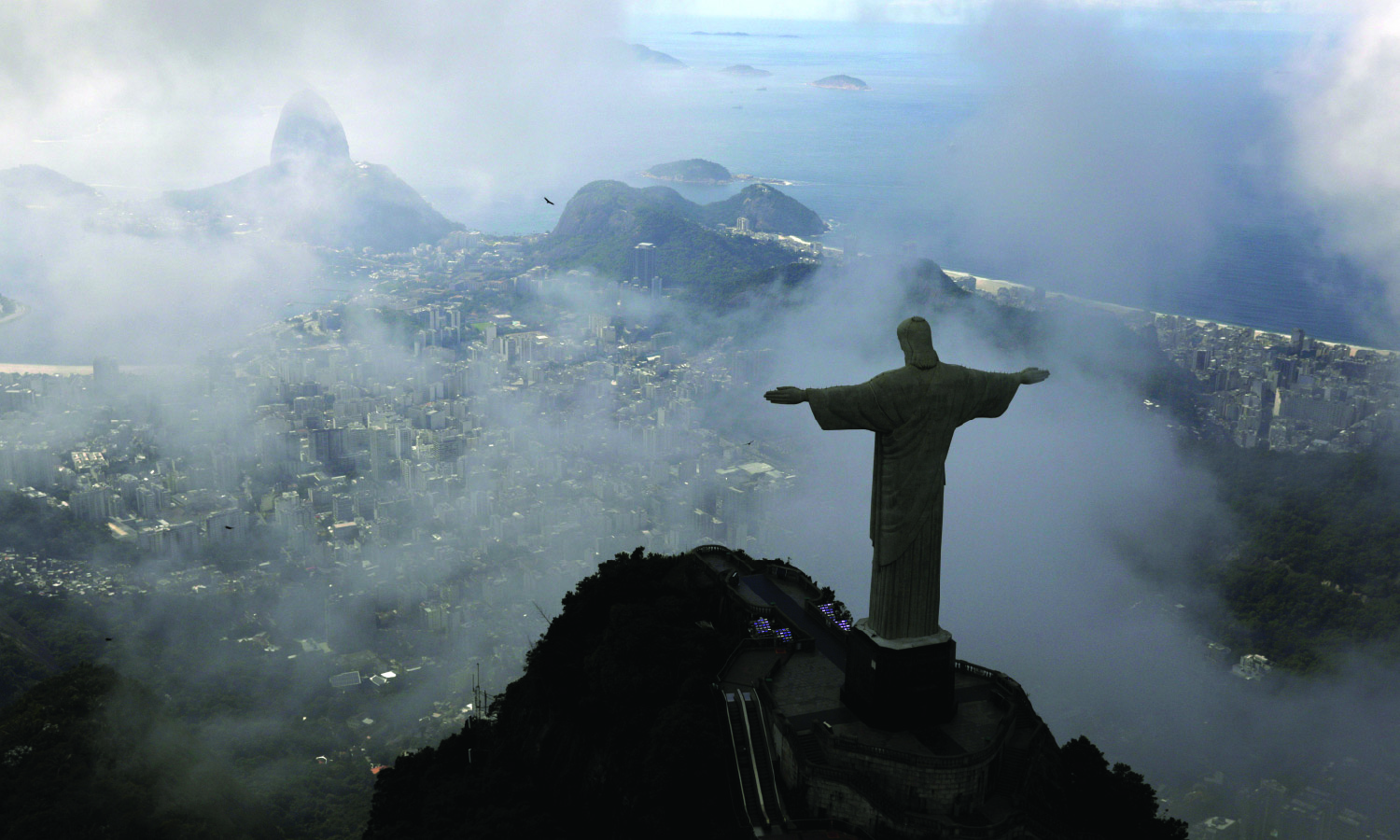 An aerial view shows the Christ the Redeemer statue, in Rio de Janeiro, Brazil on a foggy day.