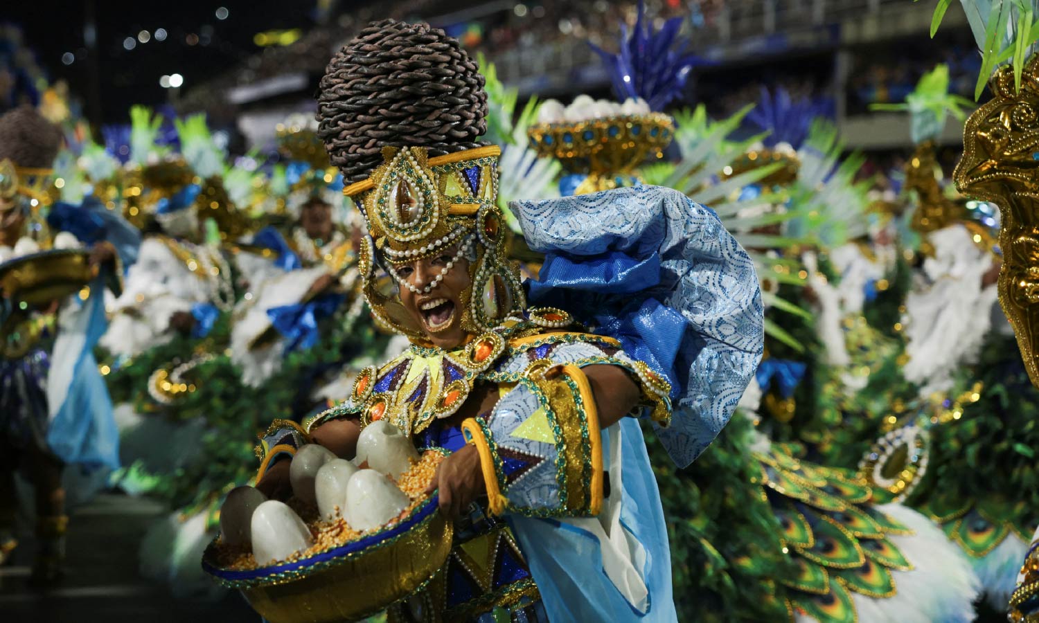 A reveller from Unidos da Tijuca samba school performs at the Sambadrome during Carnival in Rio de Janeiro.