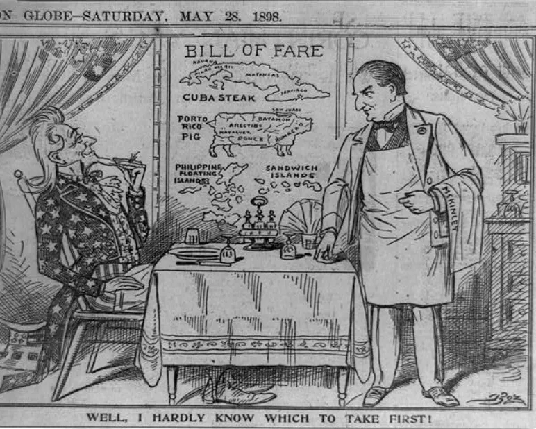 A political cartoon, published in the Boston Globe on May 28, 1898, depicts Uncle Sam seated in a restaurant, looking at a menu listing "Cuba steak" and talking to a waiter named "McKinley," who was the U.S. president at the time of the Spanish-American W