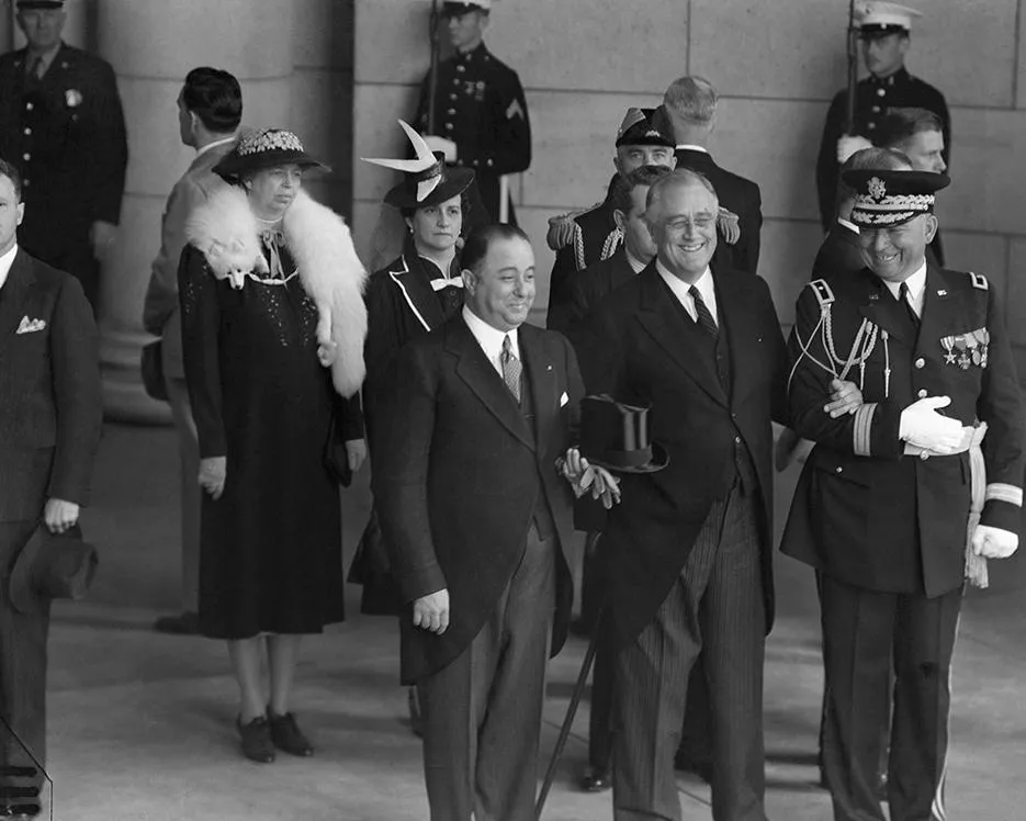 U.S. President Franklin D. Roosevelt (front center) greets Nicaraguan President Anastasio Somoza (front left) upon Somoza's arrival in Washington D.C.
