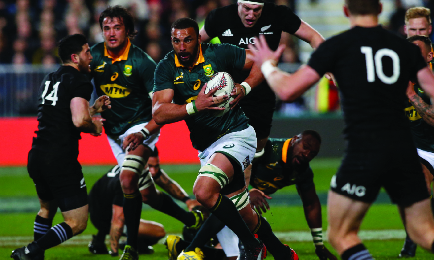 South Africa's Springboks player Uzair Cassiem charges through New Zealand's All Blacks rugby team during the Rugby Championship match in Auckland, New Zealand, on September 16, 2017.