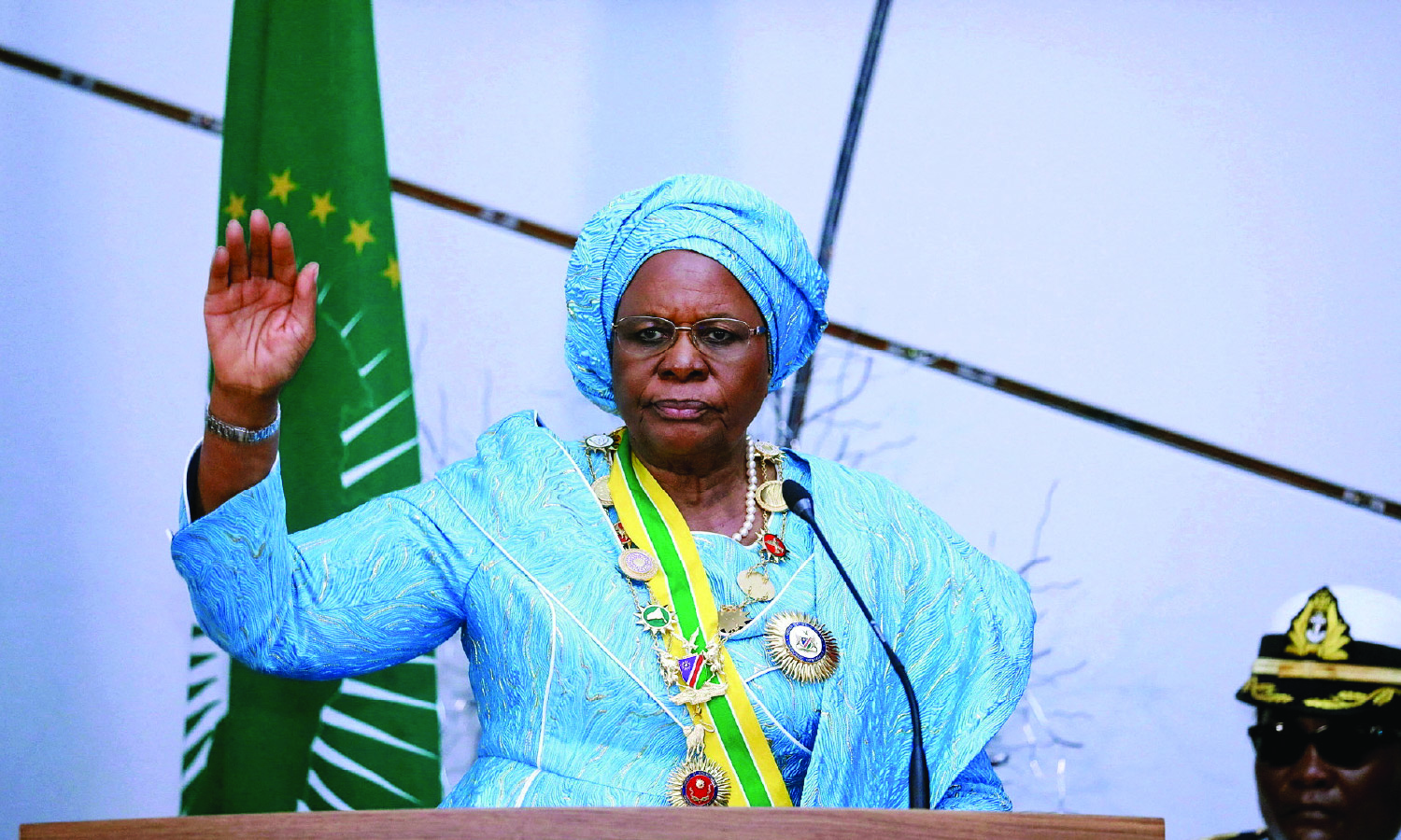 Namibia's first female President, Netumbo Nandi-Ndaitwah raises her hand during her inauguration at the State House in Windhoek, Namibia, on March 21, 2025.