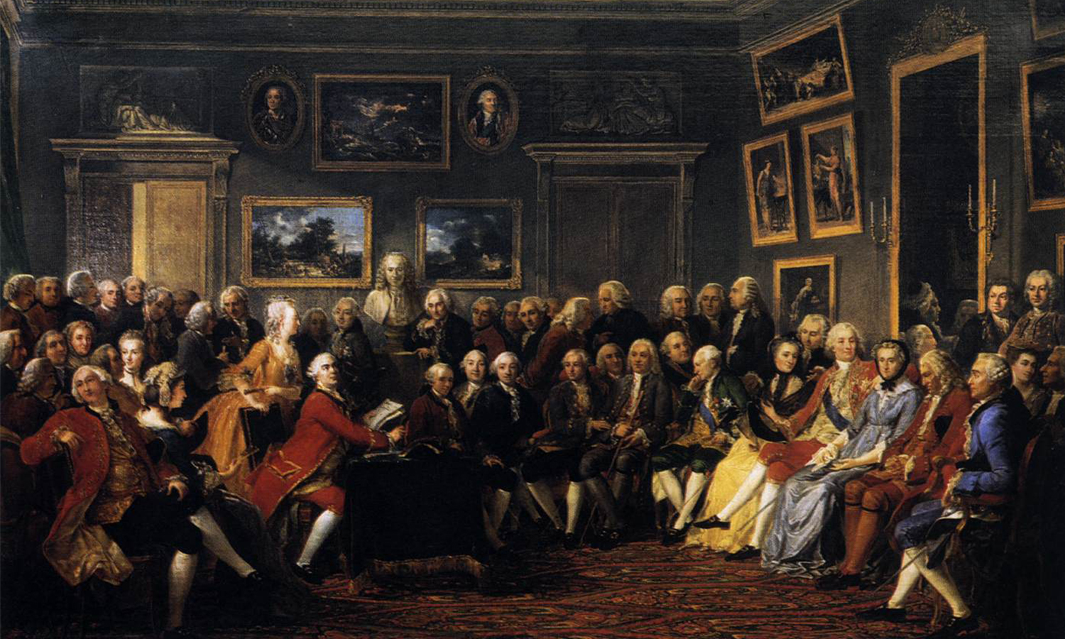 A painting depicts Enlightenment thinkers — including Jean-Jacques Rousseau, Montesquieu, and a bust of Voltaire — in a drawing room, gathered for a reading of Voltaire’s play “L’Orphelin de la Chine” in 1755.