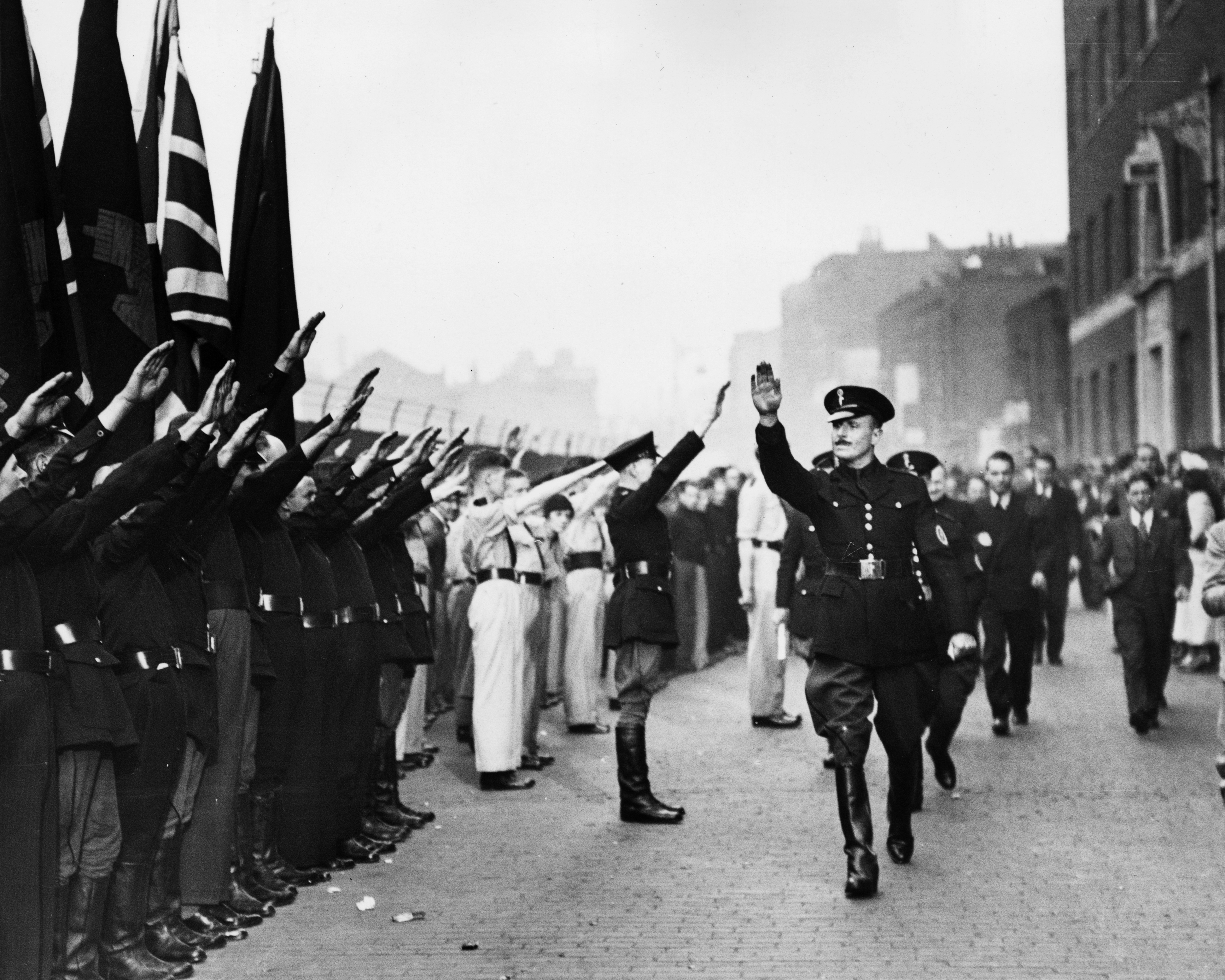 Oswald Mosley inspects members of his British Union of Fascists in London in October 4, 1936. Their presence sparked a riot that became known as the Battle of Cable Street. Source: Central Press via Getty Images.