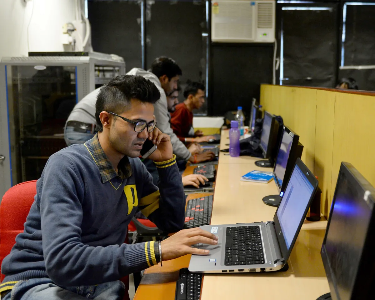 A photo showing an employee of the IT security solutions company Innefu Labs working at their offices in New Delhi, India, on December 13, 2016.