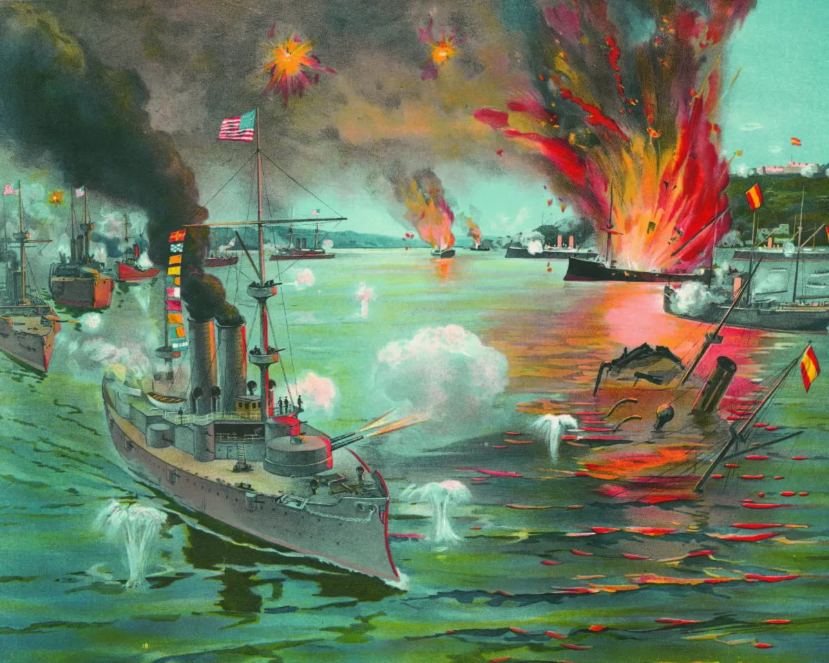 Illustration shows battleships from 1898 firing missiles and one ship is on fire, in Manila Bay in the Philippines.