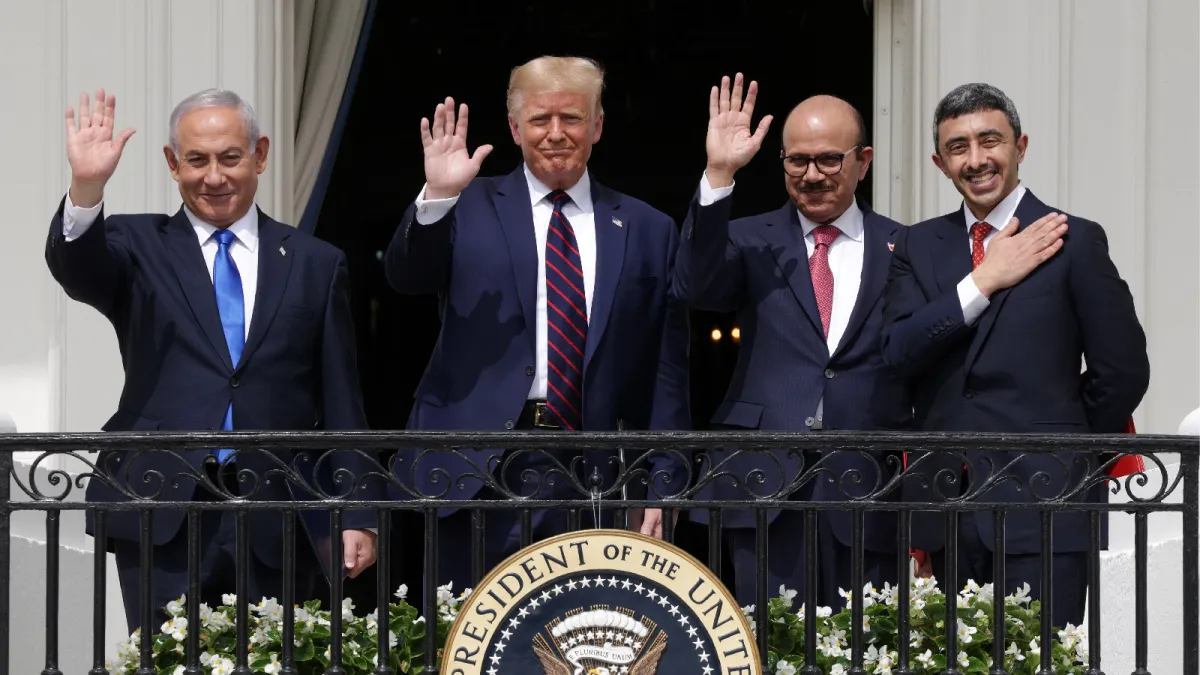 Prime Minister of Israel Benjamin Netanyahu, U.S. President Donald Trump, Foreign Affairs Minister of Bahrain Abdullatif bin Rashid Al Zayani, and Foreign Affairs Minister of the United Arab Emirates Abdullah bin Zayed bin Sultan Al Nahyan wave at the bal