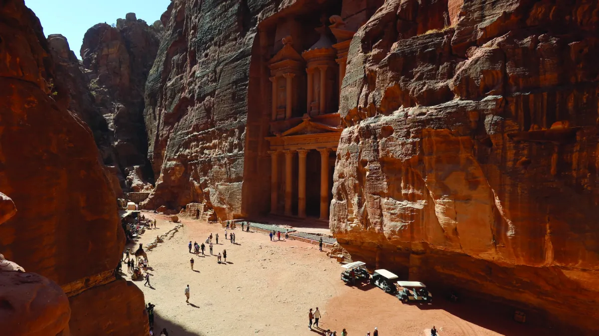 People walk in the ancient city of Petra, Jordan, October 29, 2024.