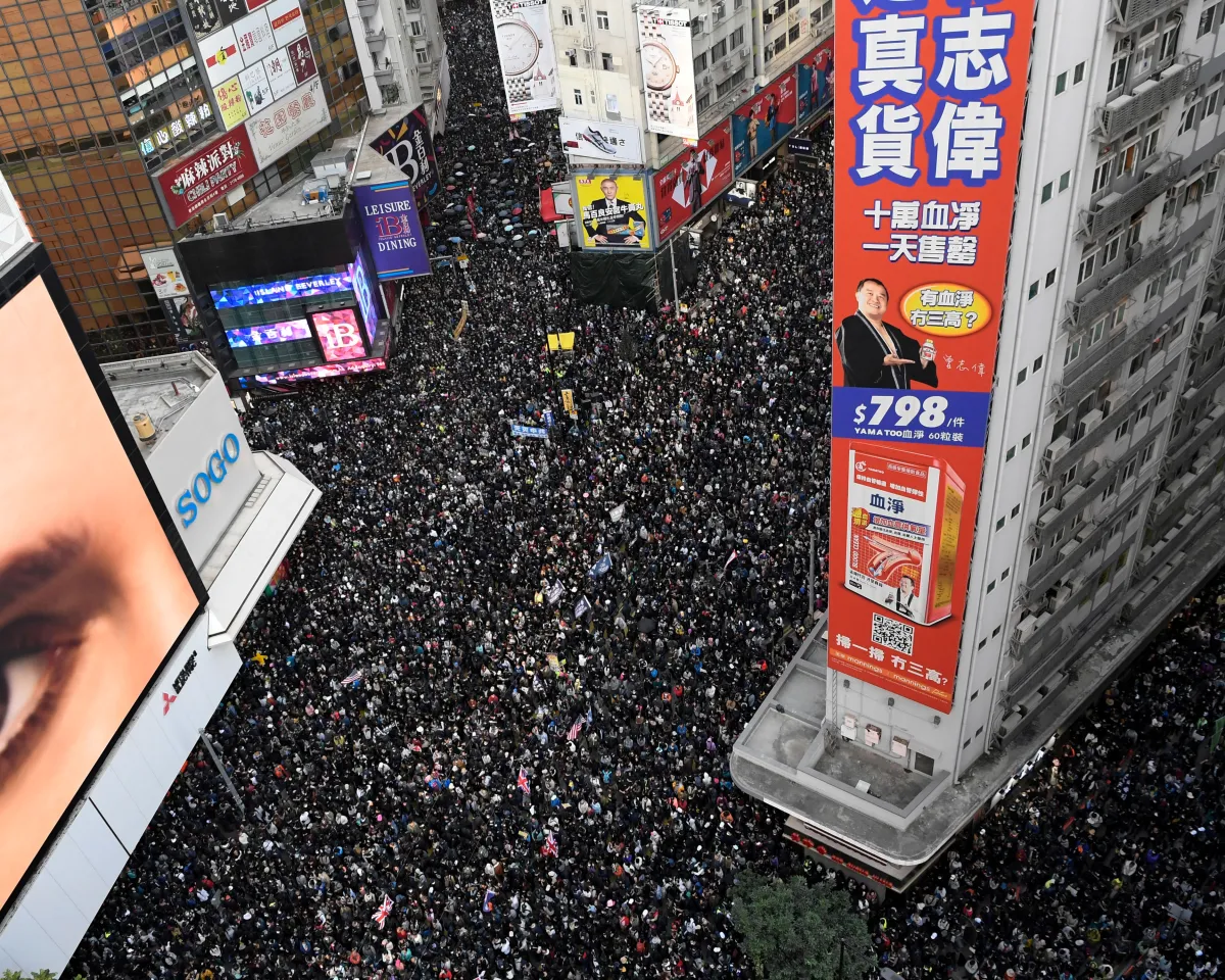 An aerial image of hundreds of thousands of people marching in Hong Kong on Human Rights Day, December 8, 2019, one day before the six-month anniversary of an anti-government movement that has plunged the city into political crisis.