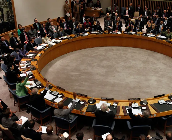 Members of the UN Security Council vote on the resolution to impose a no-fly zone on Libya during a meeting at the UN headquarters in New York on March 17, 2011. China, Brazil, Russia, India, and Germany abstained from the vote.