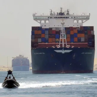 A cargo ship is seen crossing through the Suez Canal on July 25, 2015.