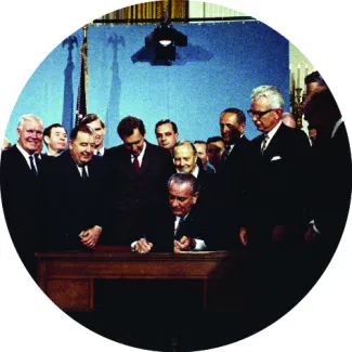 President Lyndon B. Johnson signs the Clean Air Act on November 21, 1967. 