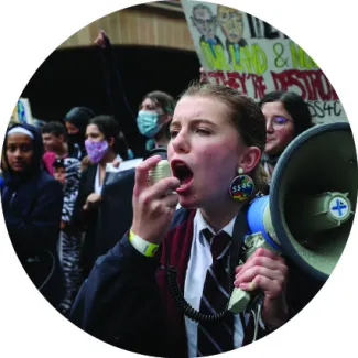 Students march during a "School Strike 4 Climate" rally in Sydney, Australia, May 21, 2021. 