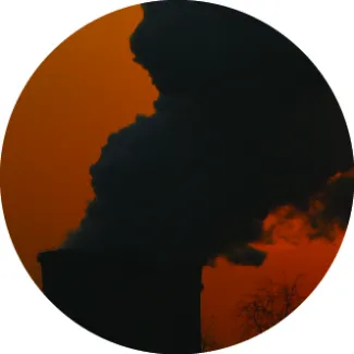 Sunset next to a coal-burning power station in Beijing, China on January 9, 2008.