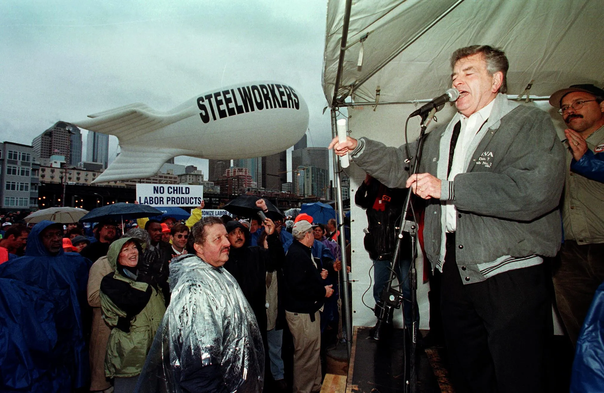George Becker, president of the US United Steelworkers of America, addresses a crowd of union members at the waterfront in Seattle, Washington, 01 December, 1999. 